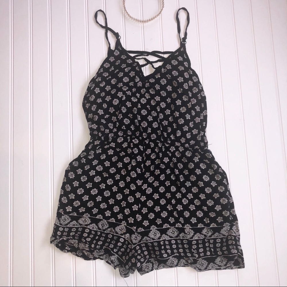 Francesca’s Black Boho Floral Lace Up Romper - Picture 3 of 7